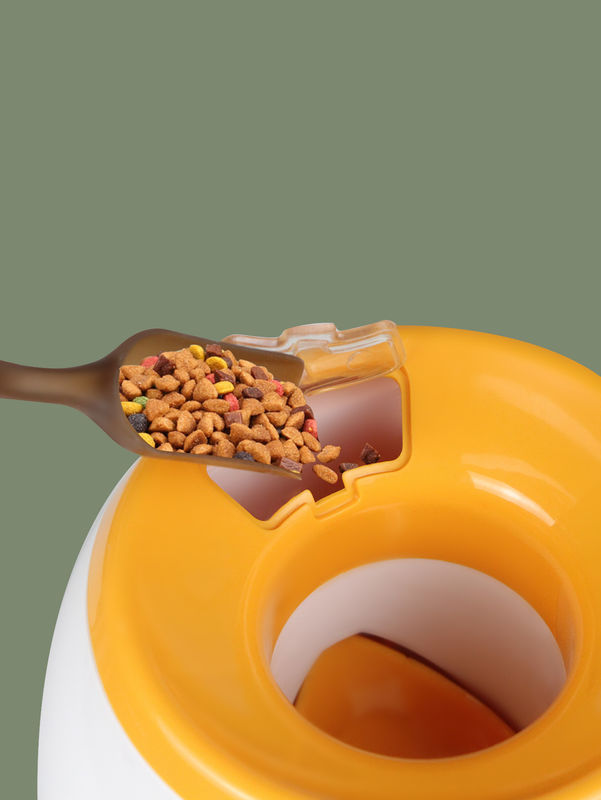 Macchina di lancio 900g della ricompensa dell'alimento di doppio tennis del foro dell'erogatore dell'ossequio dell'animale domestico