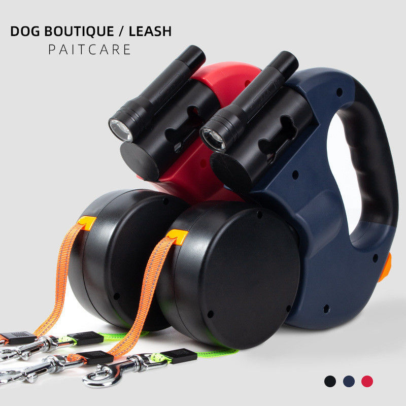 Cinghia elastica resistente del guinzaglio ritrattabile doppio riflettente del cane con le borse della poppa della torcia elettrica del LED